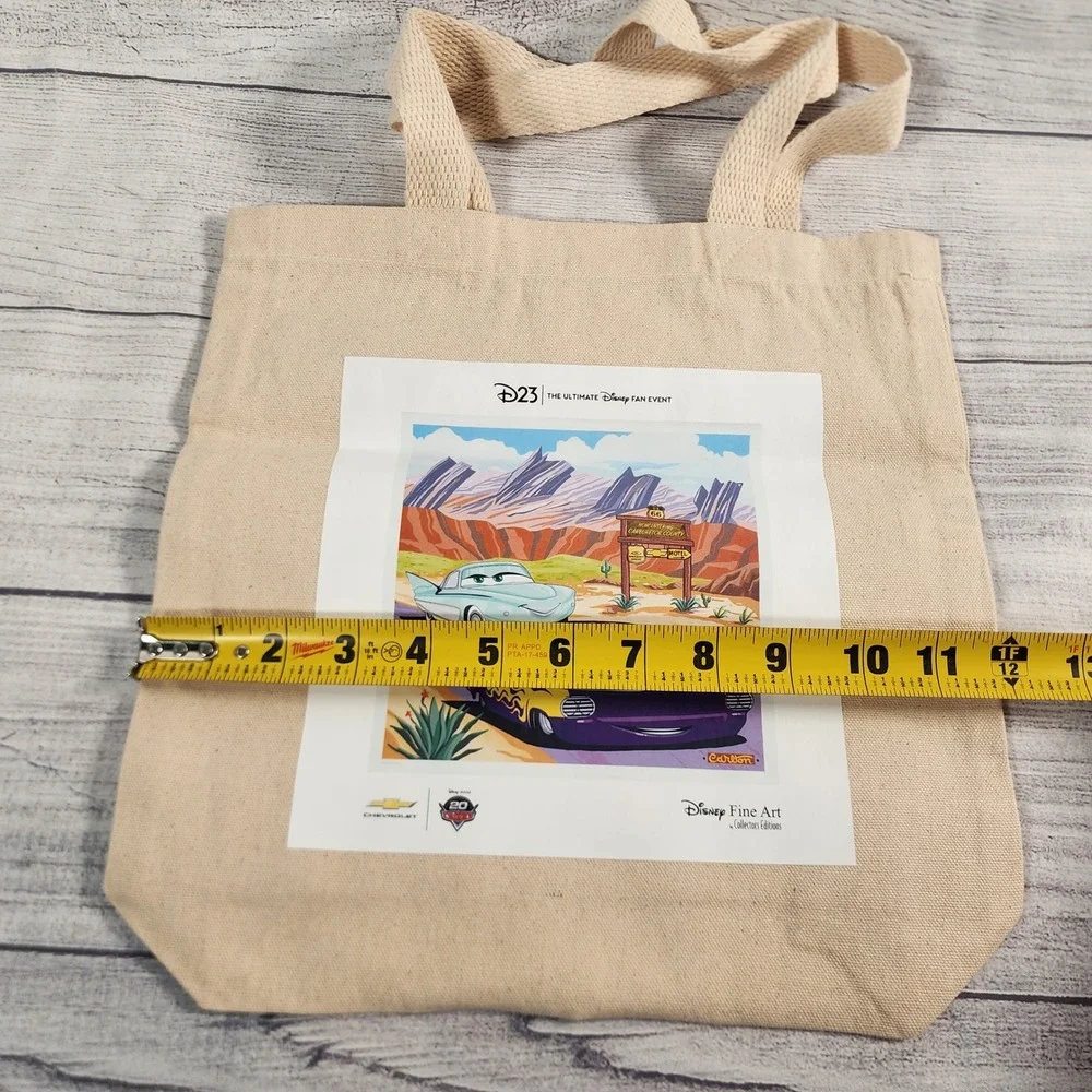 Disney D23 Expo Cars 20th Anniversary Canvas Tote Bag Ramone Flo Fine Art
